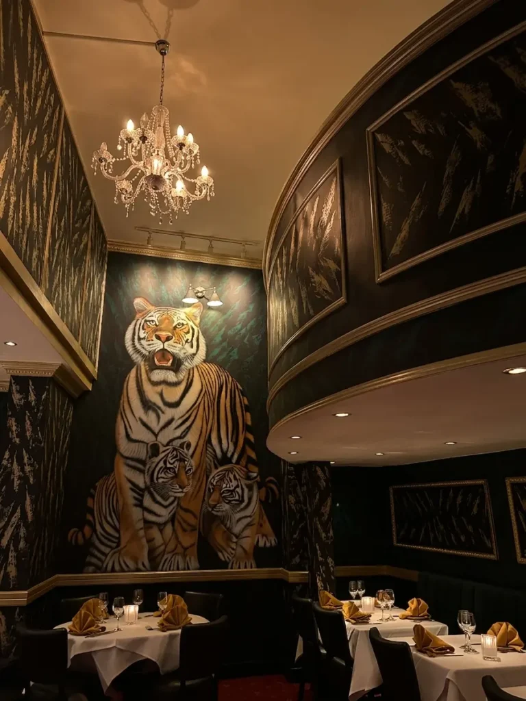 Cosy interior dining room at The India 4 Indian restaurant on Fleet Street London EC4A with warm lighting and comfortable seating